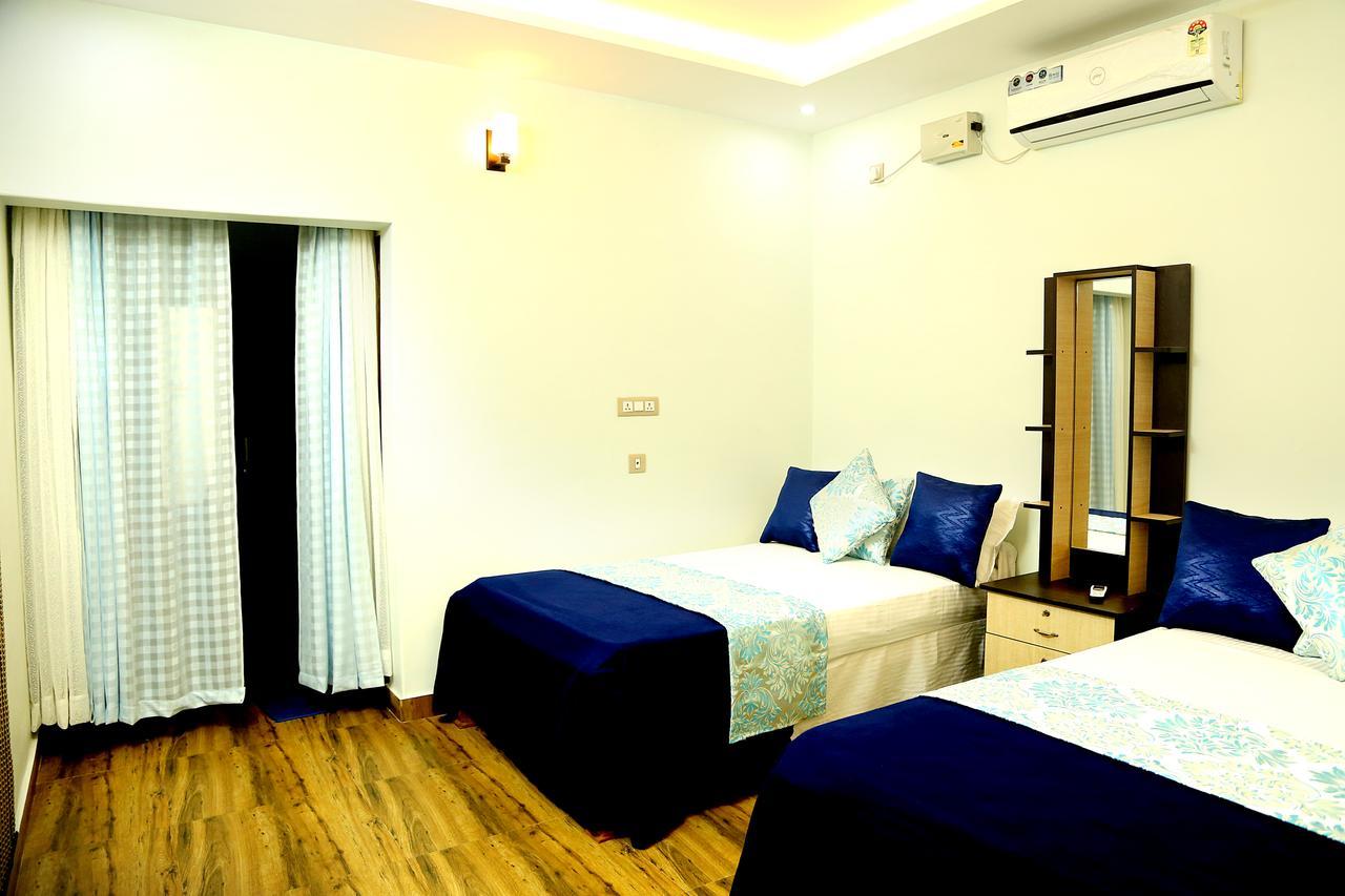 Amritham Holidays Homestay Trivandrum Thiruvananthapuram Buitenkant foto